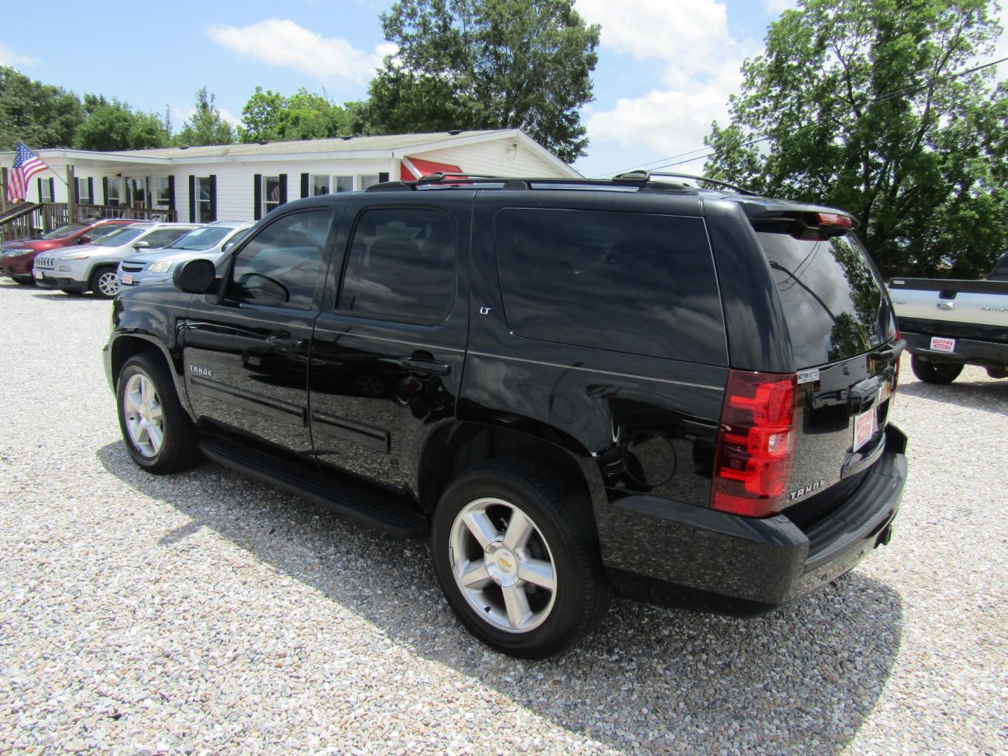 2014 Black /Tan Chevrolet Tahoe (1GNSCBE00ER) with an V8 engine, Automatic transmission, located at 15016 S Hwy 231, Midland City, AL, 36350, (334) 983-3001, 31.306210, -85.495277 - Photo#5